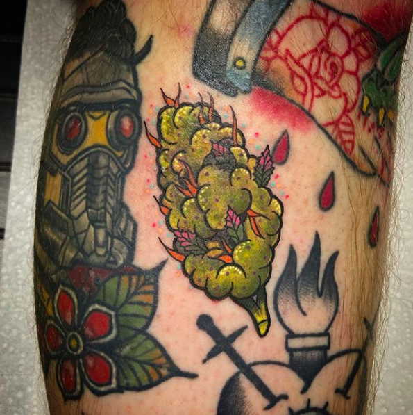 Photorealistic cannabis nug tattoo by Jessica Sheyenne